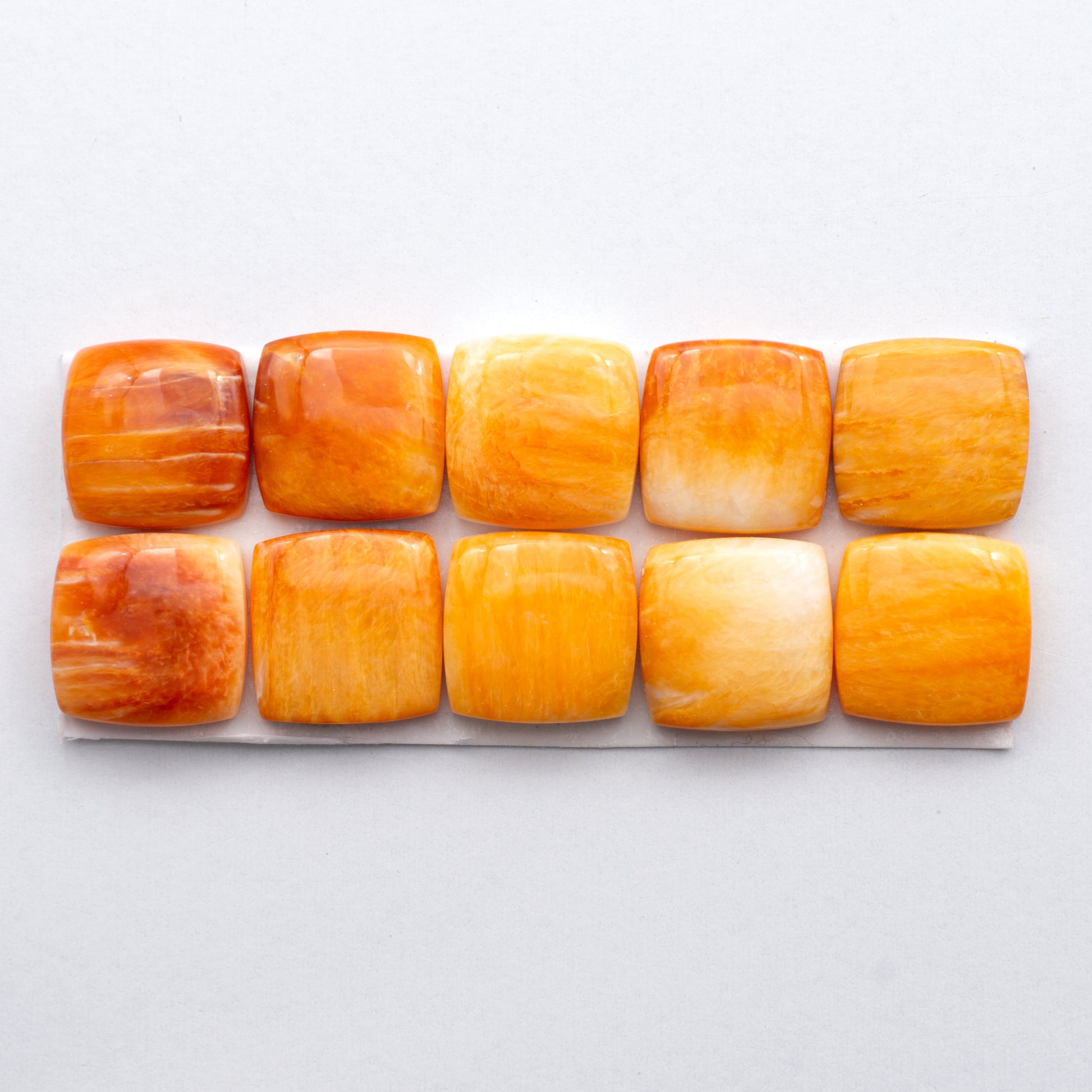 Add a unique, natural touch to your jewelry designs with our Orange Spiny Oyster Cabochons.