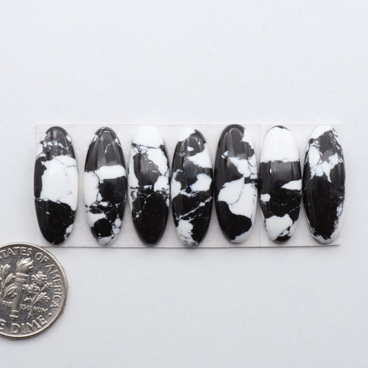 White Buffalo Cabochons are expertly cut and polished from composite material to create a stunning and durable gemstone