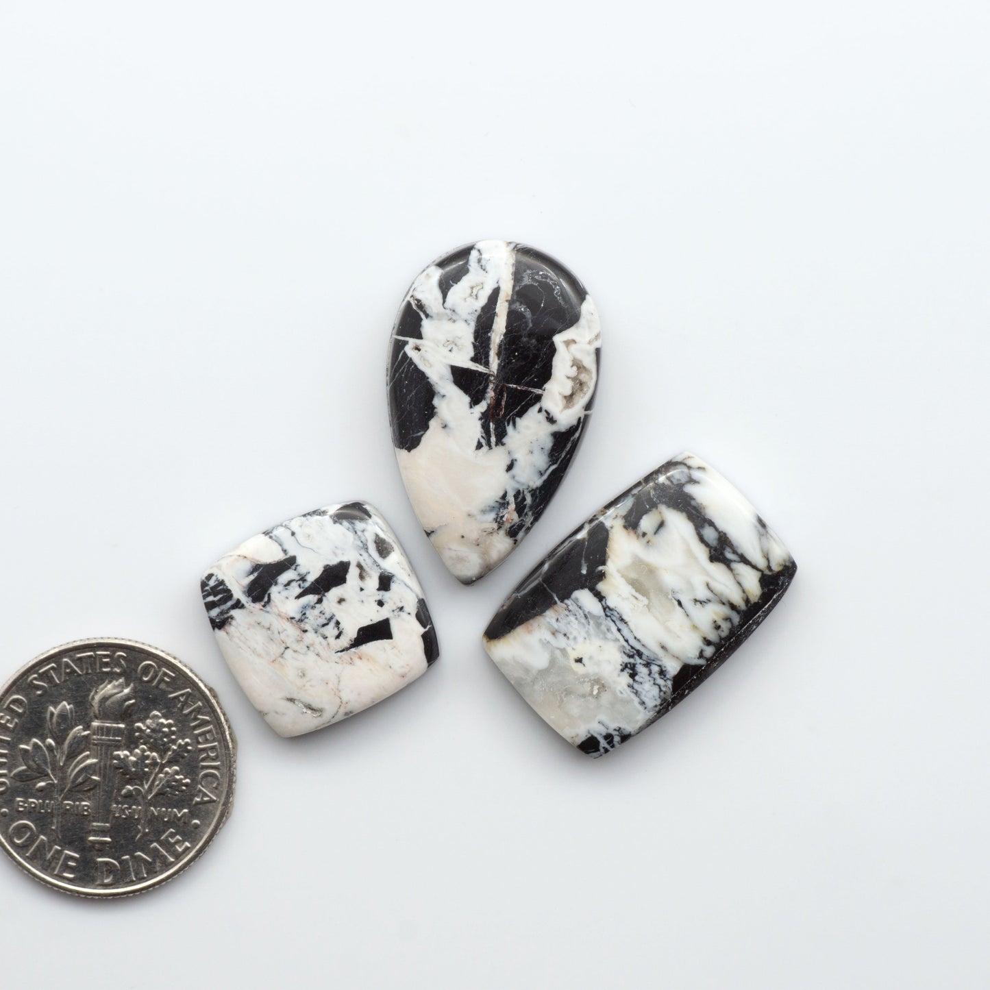 Natural White Buffalo Stone Cabochons are semi-precious gemstones cut into shapes ideal for jewelry-making, making them an excellent choice for artisans.
