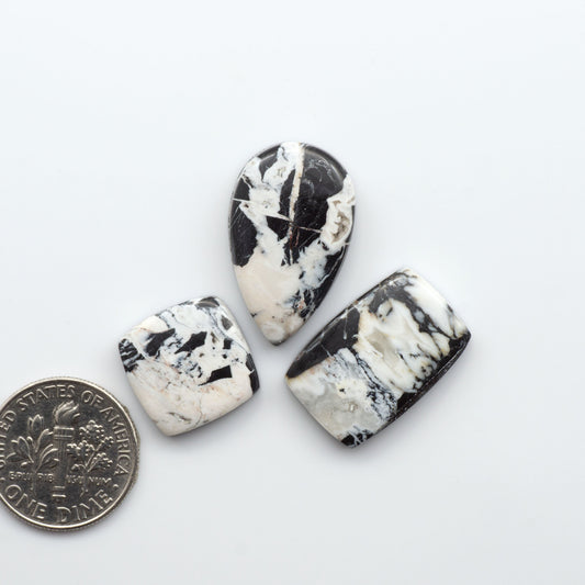 Natural White Buffalo Stone Cabochons are semi-precious gemstones cut into shapes ideal for jewelry-making, making them an excellent choice for artisans.