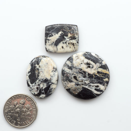 Natural White Buffalo Stone Cabochons are semi-precious gemstones cut into shapes ideal for jewelry-making, crafting and are backed for added strength. 