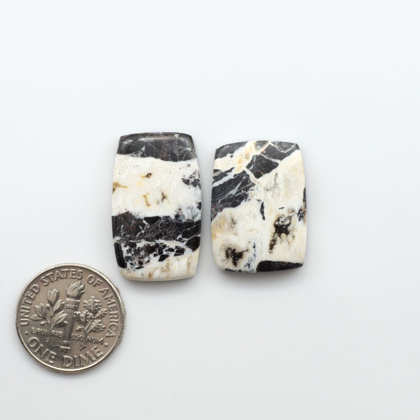 Natural White Buffalo Stone Cabochons are semi-precious gemstones cut into shapes ideal for jewelry-making, crafting and are backed for added strength. 