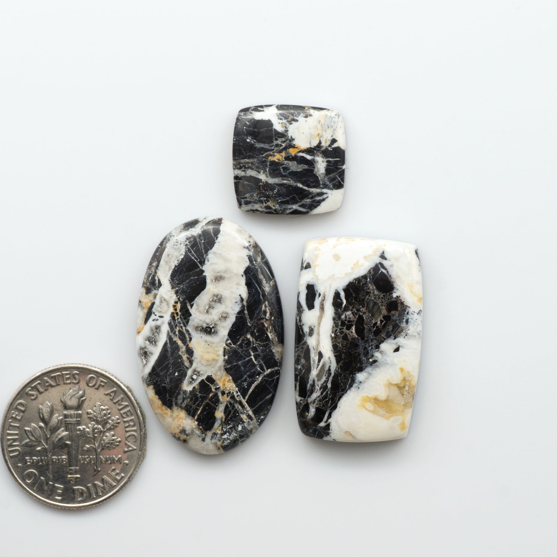 Natural White Buffalo Stone Cabochons are semi-precious gemstones cut into shapes ideal for jewelry-making, crafting and are backed for added strength. 