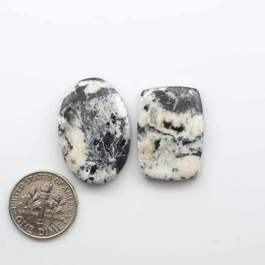 Natural White Buffalo Stone Cabochons are semi-precious gemstones cut into shapes ideal for jewelry-making, crafting and are backed for added strength. 