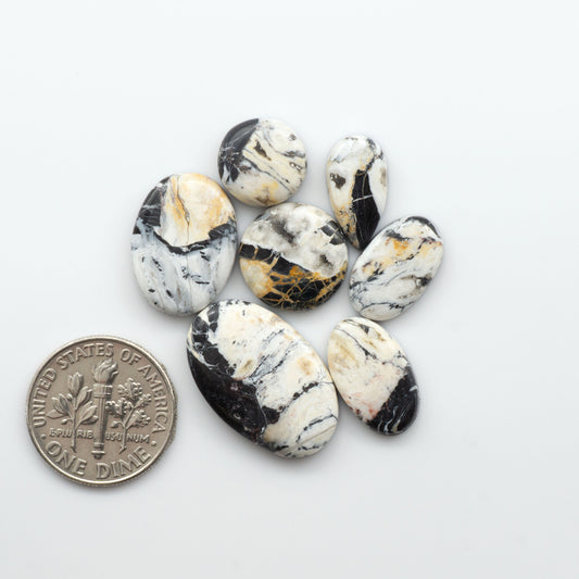 Natural White Buffalo Stone Cabochons are semi-precious gemstones cut into shapes ideal for jewelry-making, crafting and are backed for added strength. 