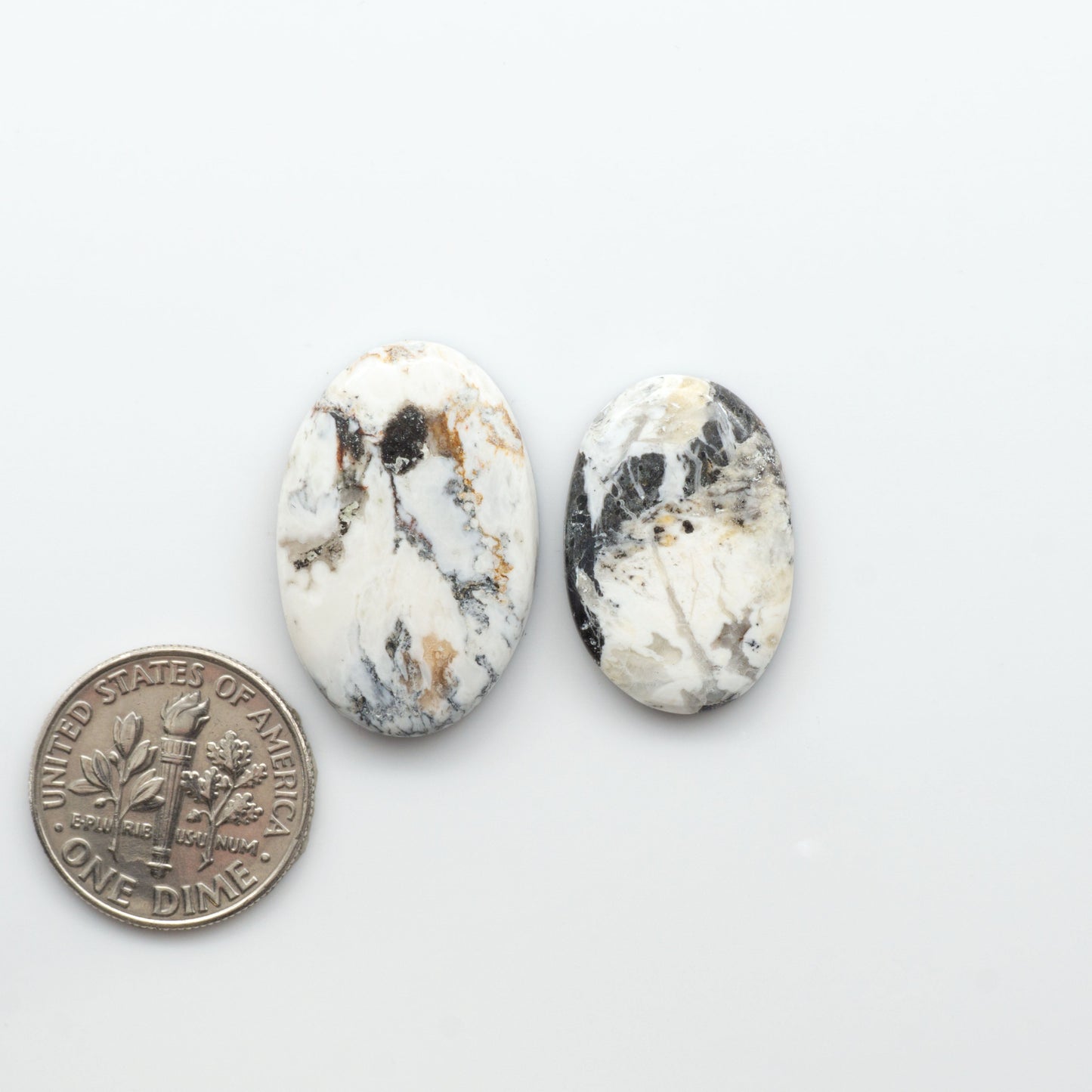 Natural White Buffalo Stone Cabochons are semi-precious gemstones cut into shapes ideal for jewelry-making, crafting and are backed for added strength. 