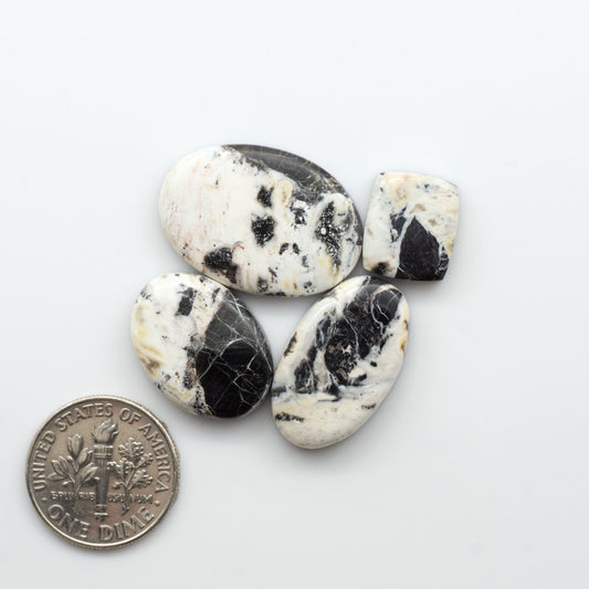 Natural White Buffalo Stone Cabochons are semi-precious gemstones cut into shapes ideal for jewelry-making, crafting and are backed for added strength. 