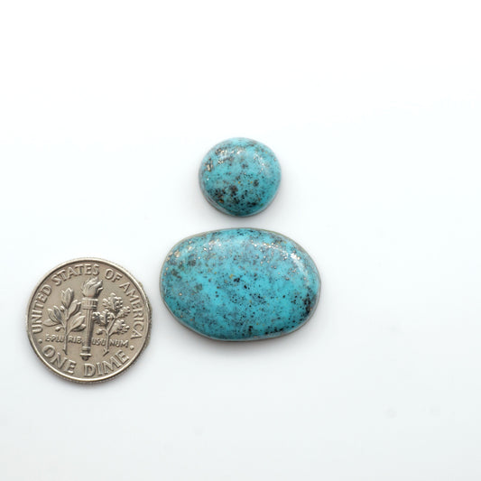 Nacozari turquoise cabochons are striking gemstones known for their vibrant blue to greenish-blue colors and pyrite, these stones are prized in jewelry making.