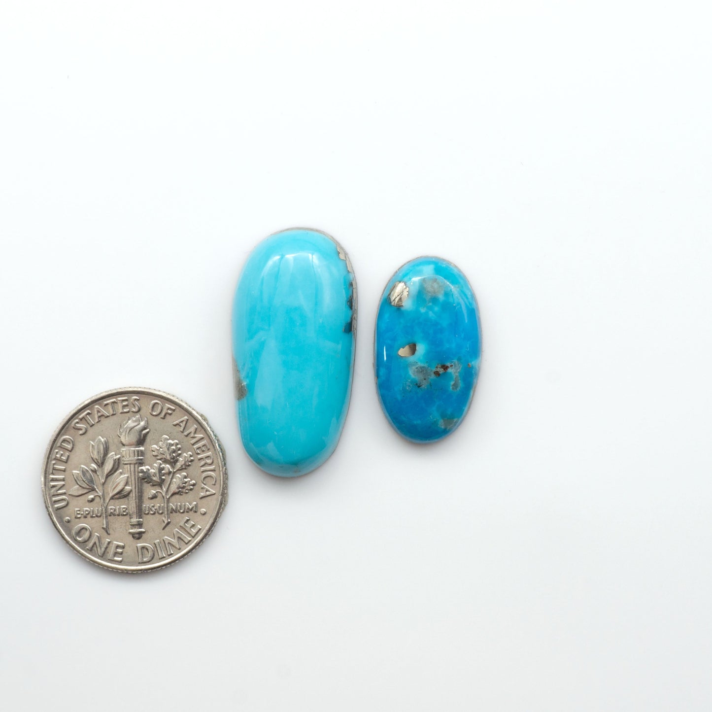 Nacozari turquoise cabochons are striking gemstones known for their vibrant blue to greenish-blue colors and pyrite, these stones are prized in jewelry making.