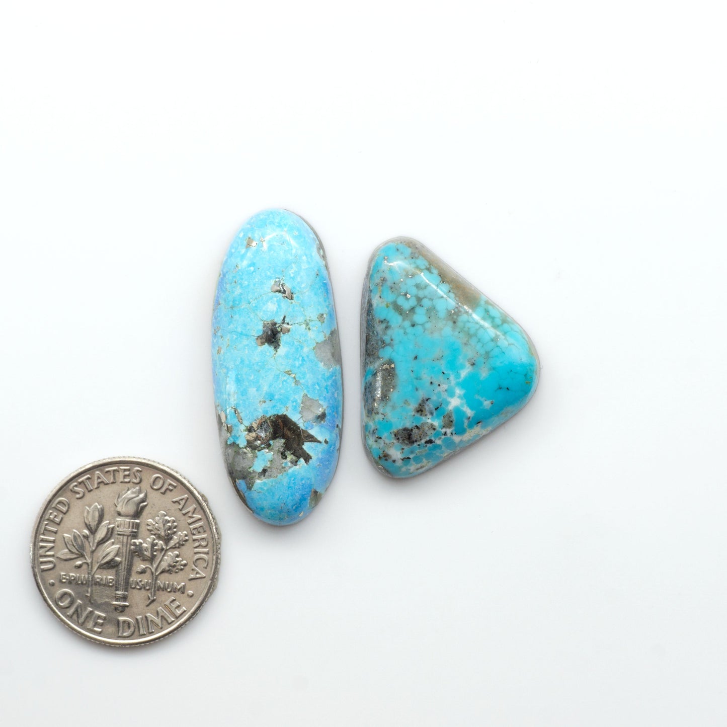 Nacozari turquoise cabochons are striking gemstones known for their vibrant blue to greenish-blue colors and pyrite, these stones are prized in jewelry making.