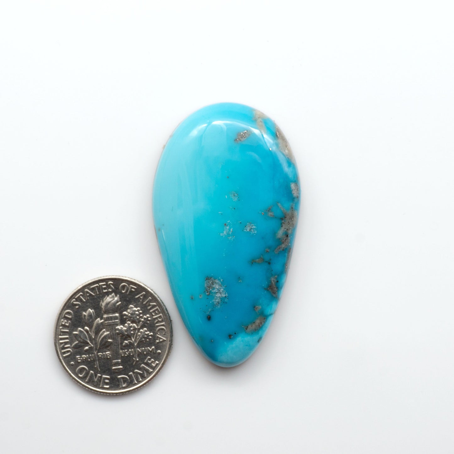Nacozari turquoise cabochons are striking gemstones known for their vibrant blue to greenish-blue colors and pyrite, these stones are prized in jewelry making.