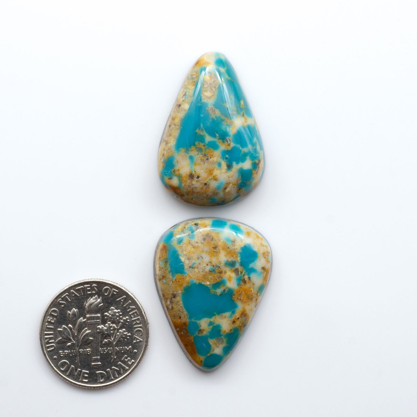 Kingman Turquoise Cabochons are a staple in the jewelry industry, known for their stunning blue-green color. Perfect for necklaces, earrings, and more!