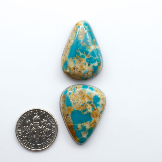 Kingman Turquoise Cabochons are a staple in the jewelry industry, known for their stunning blue-green color. Perfect for necklaces, earrings, and more!