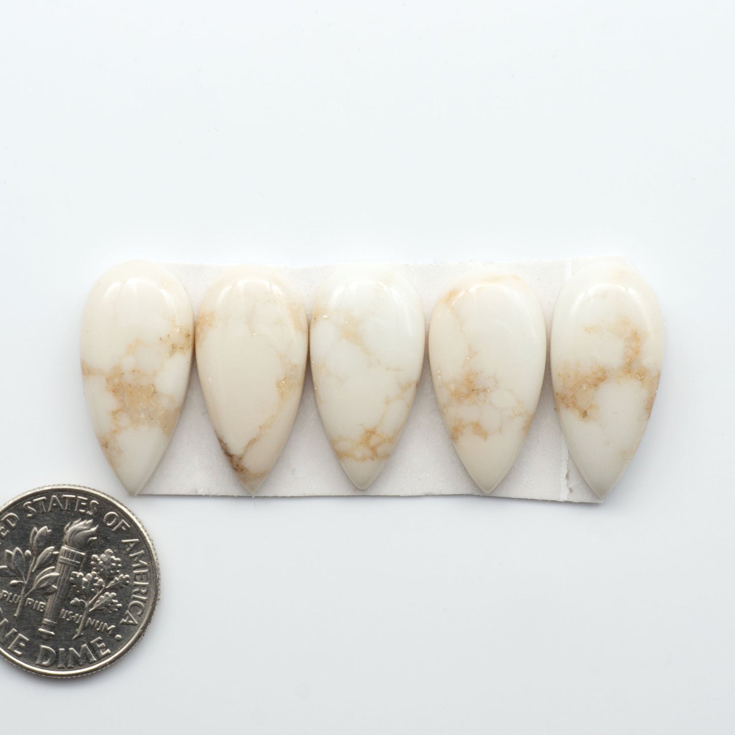 Magnesite Cabochons are a must-have for jewelry makers. These stones feature a unique blend of white and brown making them perfect for a variety of designs.