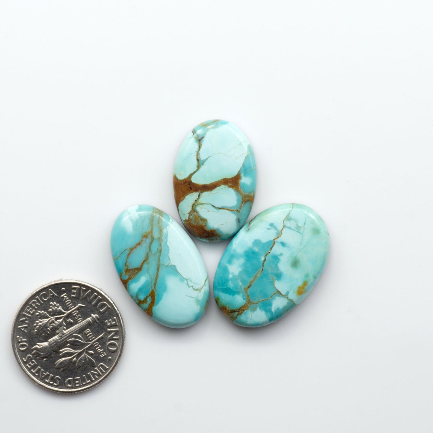 Add a touch of beauty to your collection with our stunning Pilot Mountain Turquoise Cabochons. Perfect for jewelry making each piece is truly one-of-a-kind.