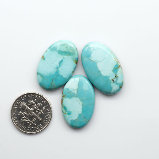 Add a touch of beauty to your collection with our stunning Pilot Mountain Turquoise Cabochons. Perfect for jewelry making each piece is truly one-of-a-kind.