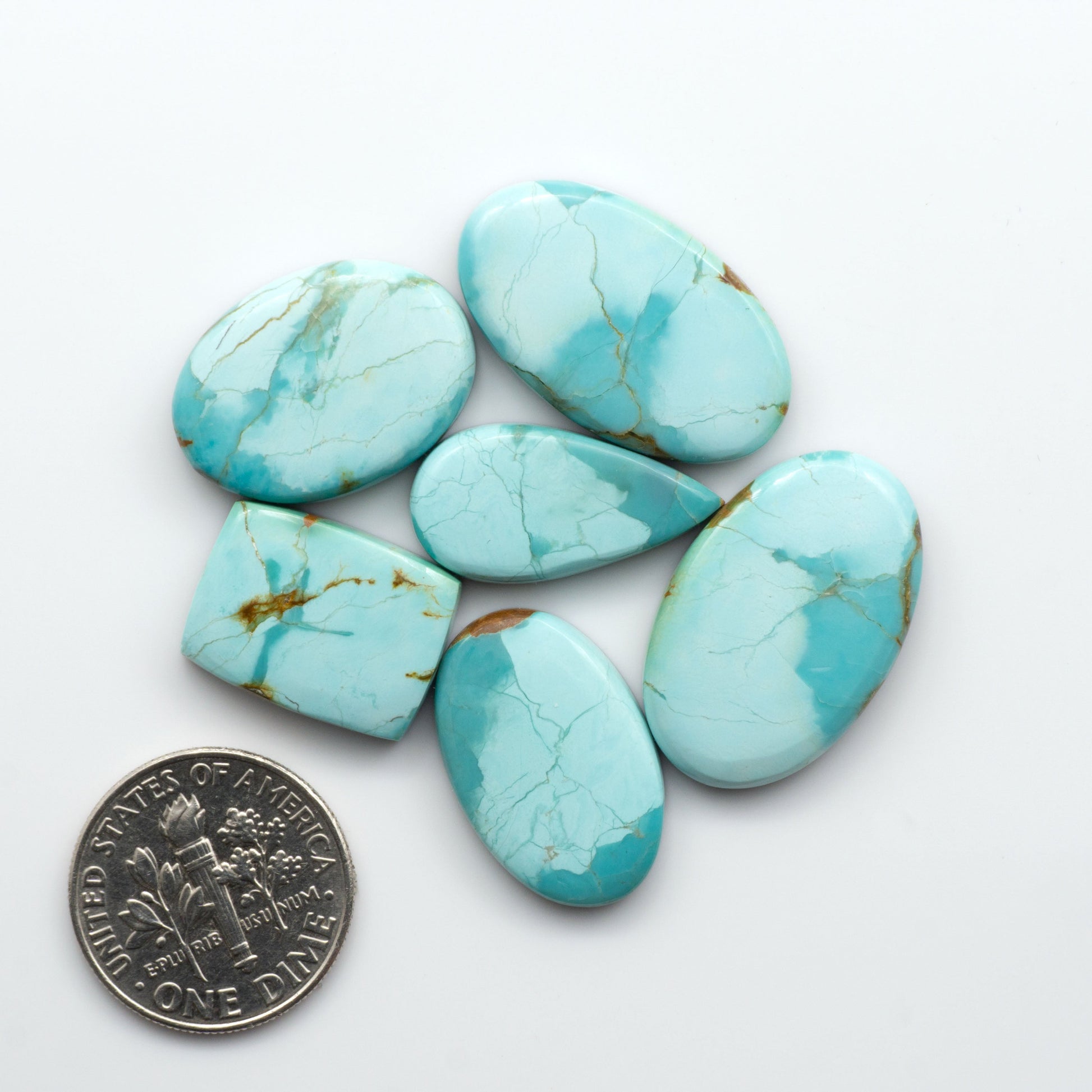 Add a touch of beauty to your collection with our stunning Pilot Mountain Turquoise Cabochons. Perfect for jewelry making each piece is truly one-of-a-kind.
