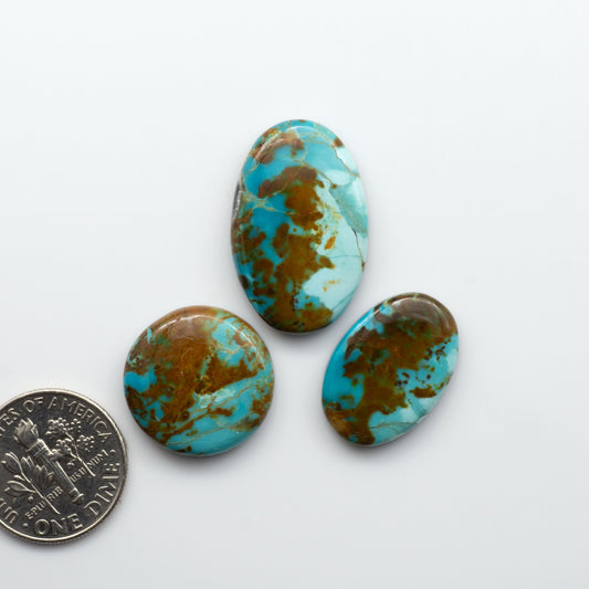 Add a touch of beauty to your collection with our stunning Pilot Mountain Turquoise Cabochons. Perfect for jewelry making each piece is truly one-of-a-kind.