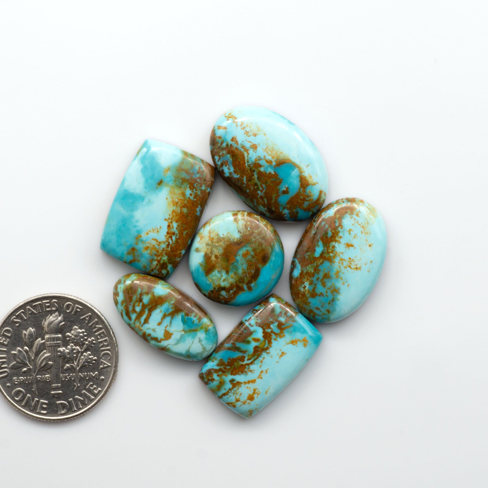 Add a touch of beauty to your collection with our stunning Pilot Mountain Turquoise Cabochons. Perfect for jewelry making each piece is truly one-of-a-kind.