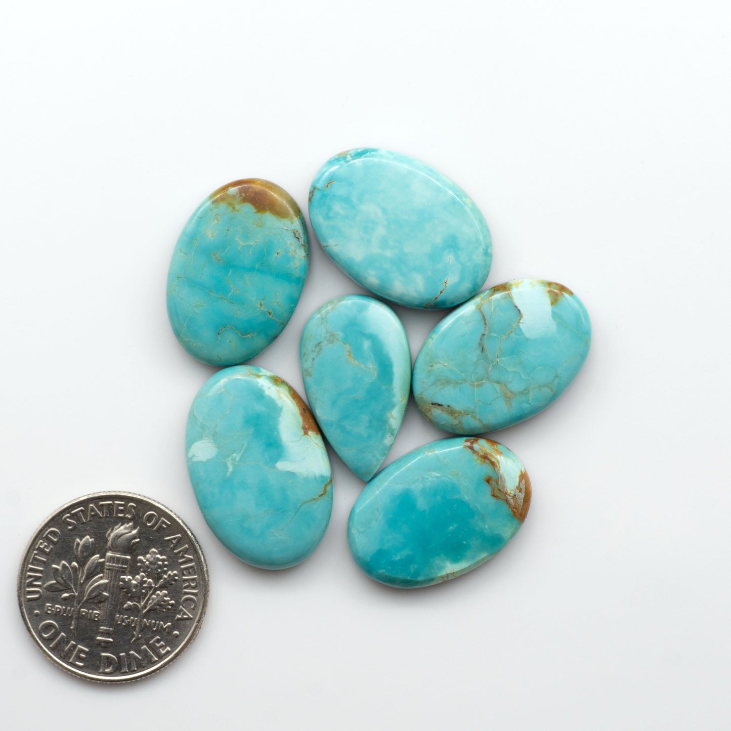 Add a touch of beauty to your collection with our stunning Pilot Mountain Turquoise Cabochons. Perfect for jewelry making each piece is truly one-of-a-kind.