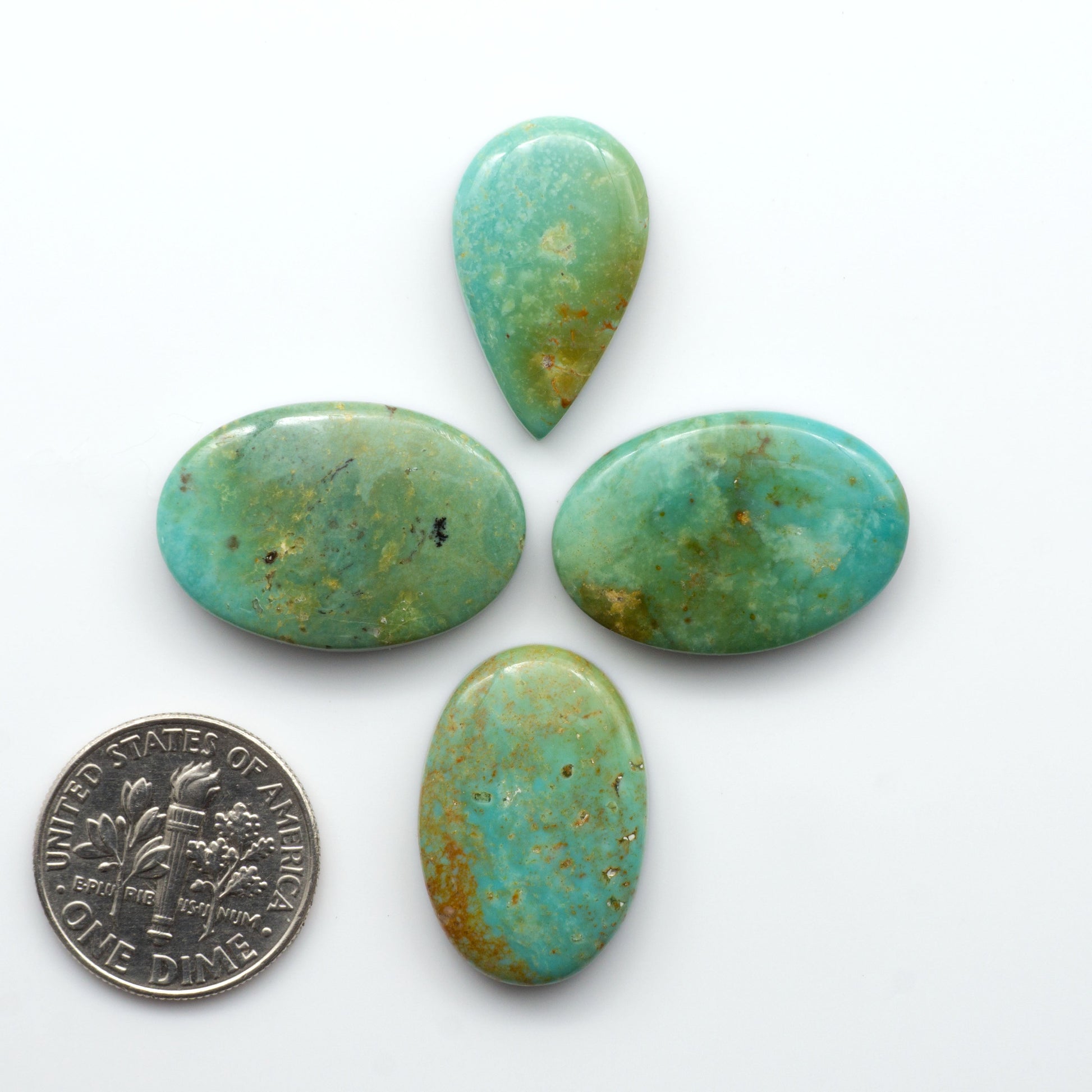 Experience the beauty of Turquoise Mountain Cabochons. With their distinctive blue and green color, these gemstones are perfect for any jewelry piece.