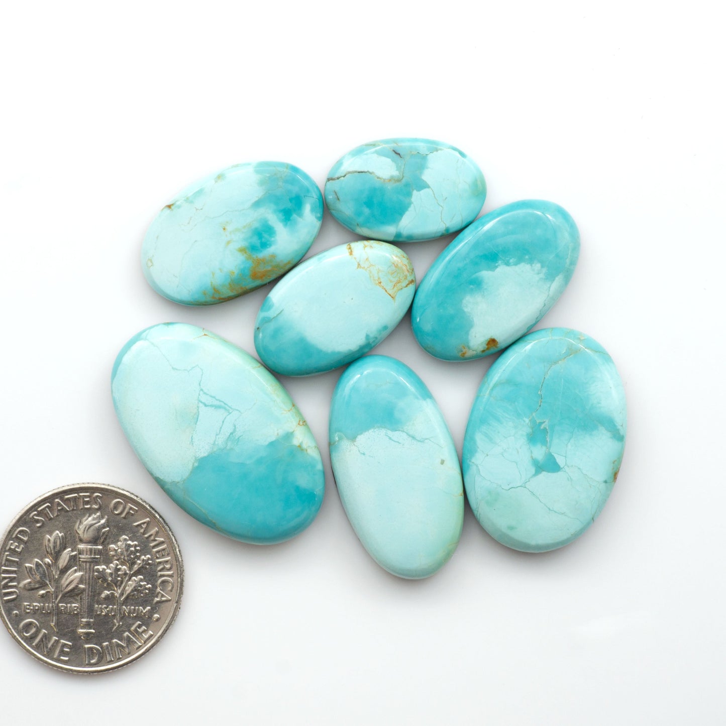Add a touch of beauty to your collection with our stunning Pilot Mountain Turquoise Cabochons. Perfect for jewelry making each piece is truly one-of-a-kind.