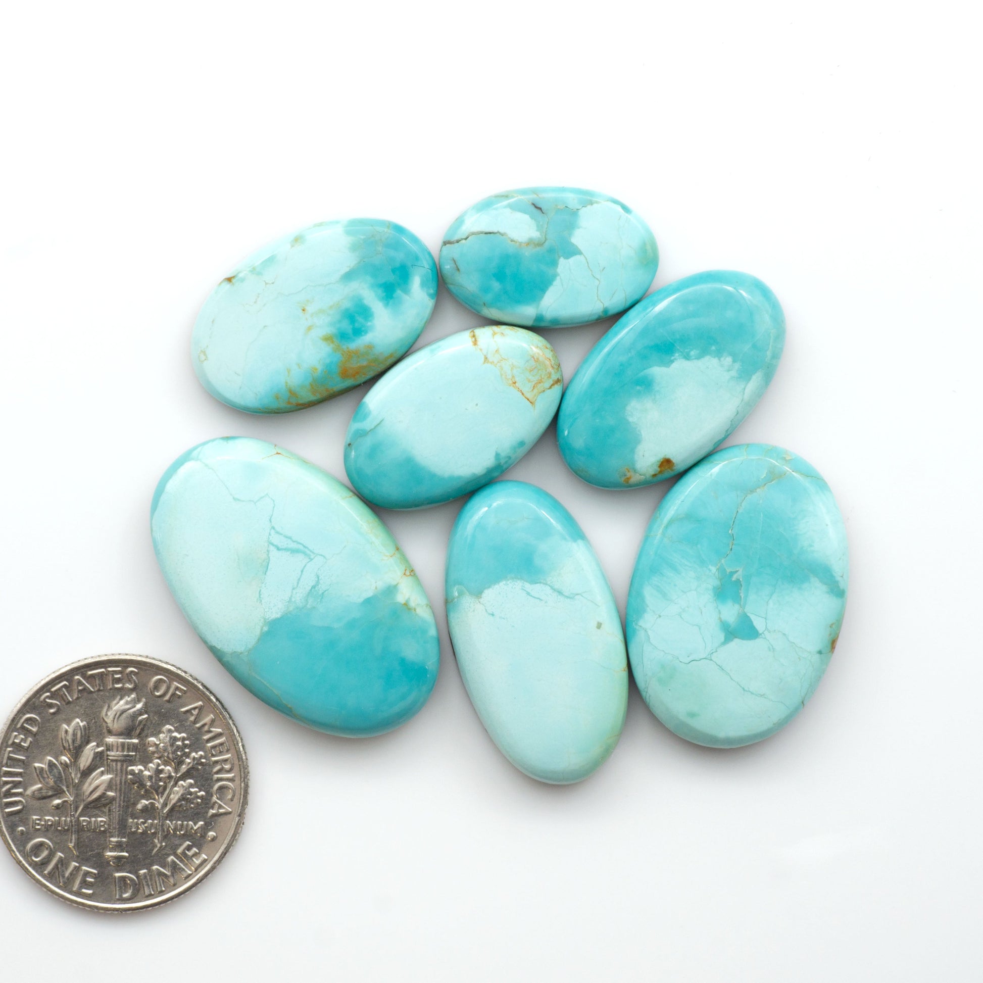 Add a touch of beauty to your collection with our stunning Pilot Mountain Turquoise Cabochons. Perfect for jewelry making each piece is truly one-of-a-kind.