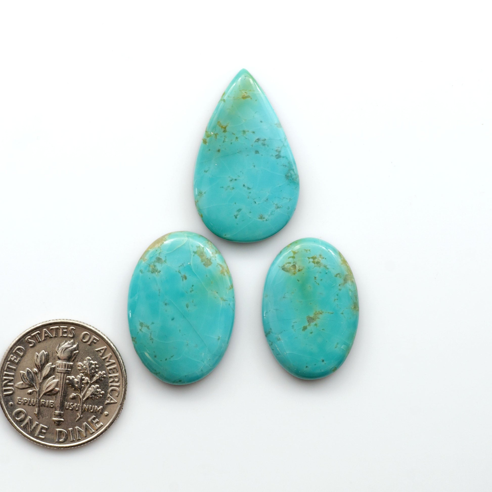 Add a touch of beauty to your collection with our stunning Pilot Mountain Turquoise Cabochons. Perfect for jewelry making each piece is truly one-of-a-kind.