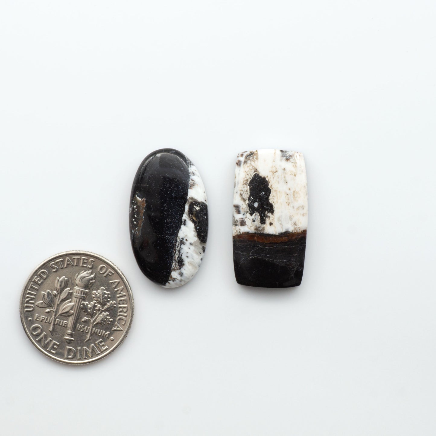 Natural White Buffalo Stone Cabochons are semi-precious gemstones cut into shapes ideal for jewelry-making, making them an excellent choice for artisans.