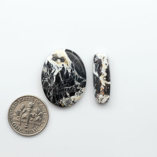 Natural White Buffalo Stone Cabochons are semi-precious gemstones cut into shapes ideal for jewelry-making, making them an excellent choice for artisans.