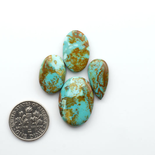 Add a touch of beauty to your collection with our stunning Pilot Mountain Turquoise Cabochons. Perfect for jewelry making each piece is truly one-of-a-kind.