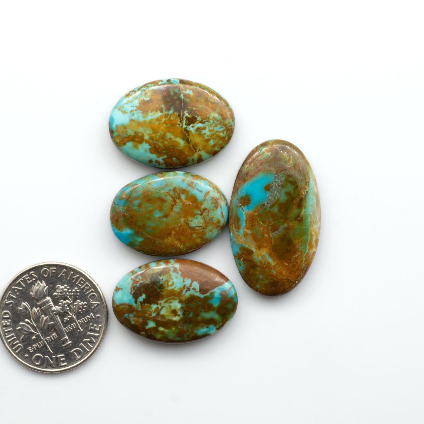 Add a touch of beauty to your collection with our stunning Pilot Mountain Turquoise Cabochons. Perfect for jewelry making each piece is truly one-of-a-kind.