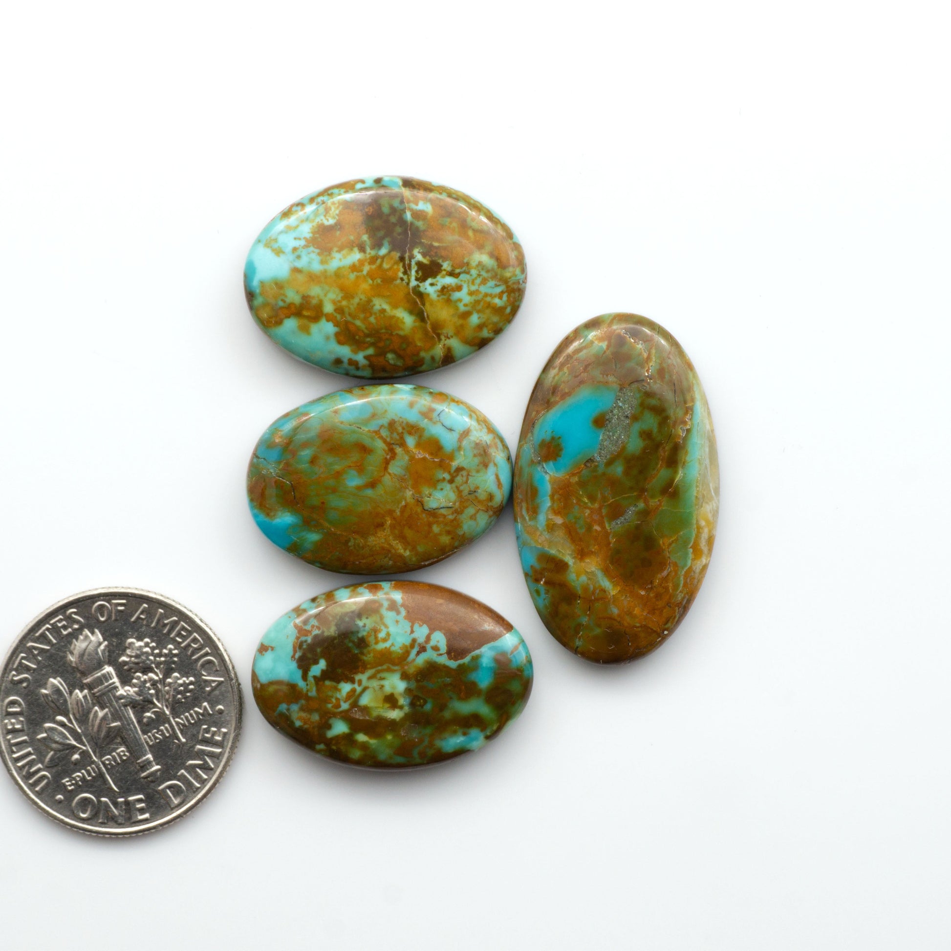 Add a touch of beauty to your collection with our stunning Pilot Mountain Turquoise Cabochons. Perfect for jewelry making each piece is truly one-of-a-kind.