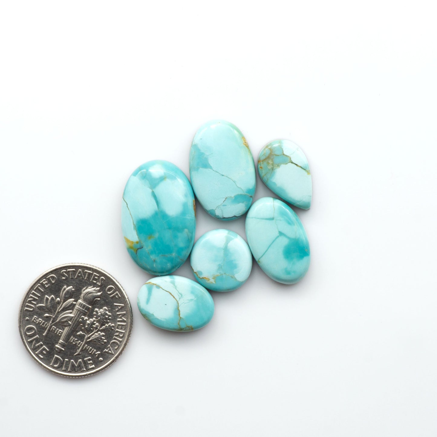 Add a touch of beauty to your collection with our stunning Pilot Mountain Turquoise Cabochons. Perfect for jewelry making each piece is truly one-of-a-kind.