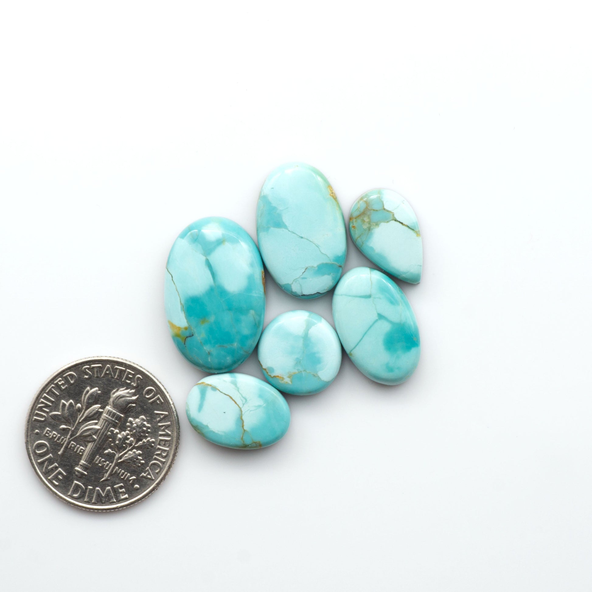 Add a touch of beauty to your collection with our stunning Pilot Mountain Turquoise Cabochons. Perfect for jewelry making each piece is truly one-of-a-kind.