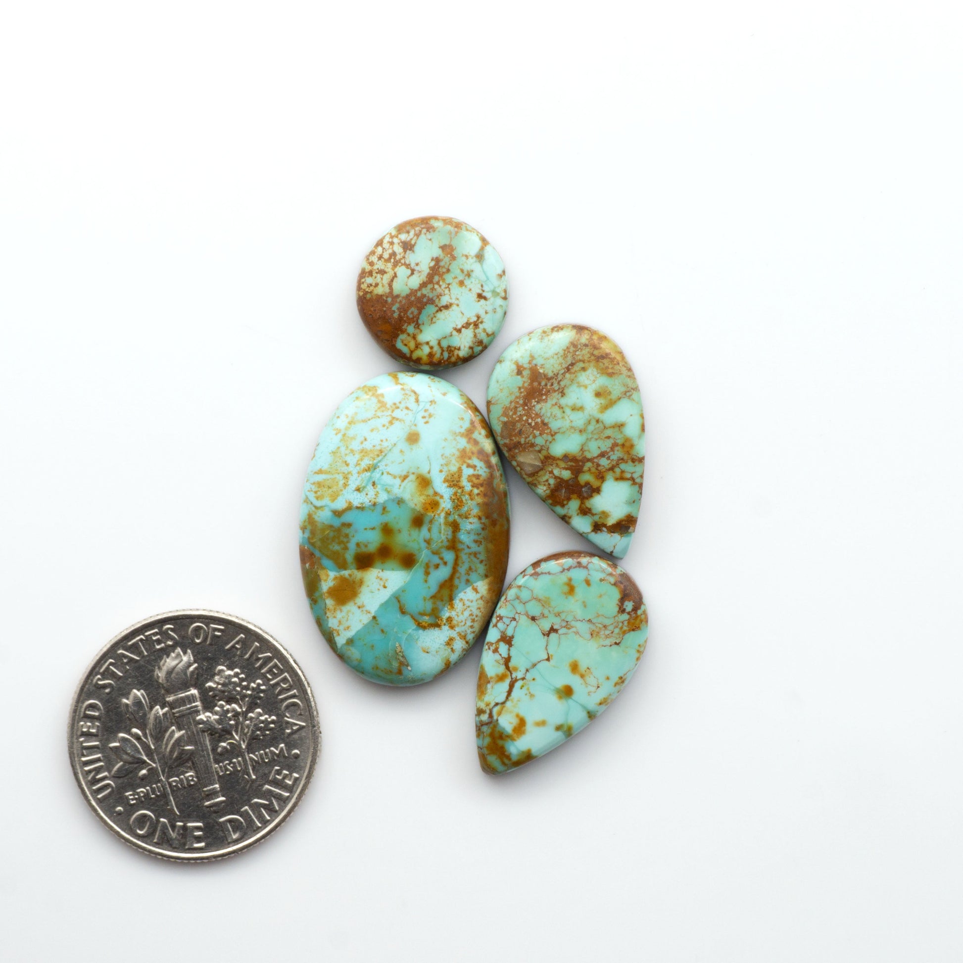 Add a touch of beauty to your collection with our stunning Pilot Mountain Turquoise Cabochons. Perfect for jewelry making each piece is truly one-of-a-kind.