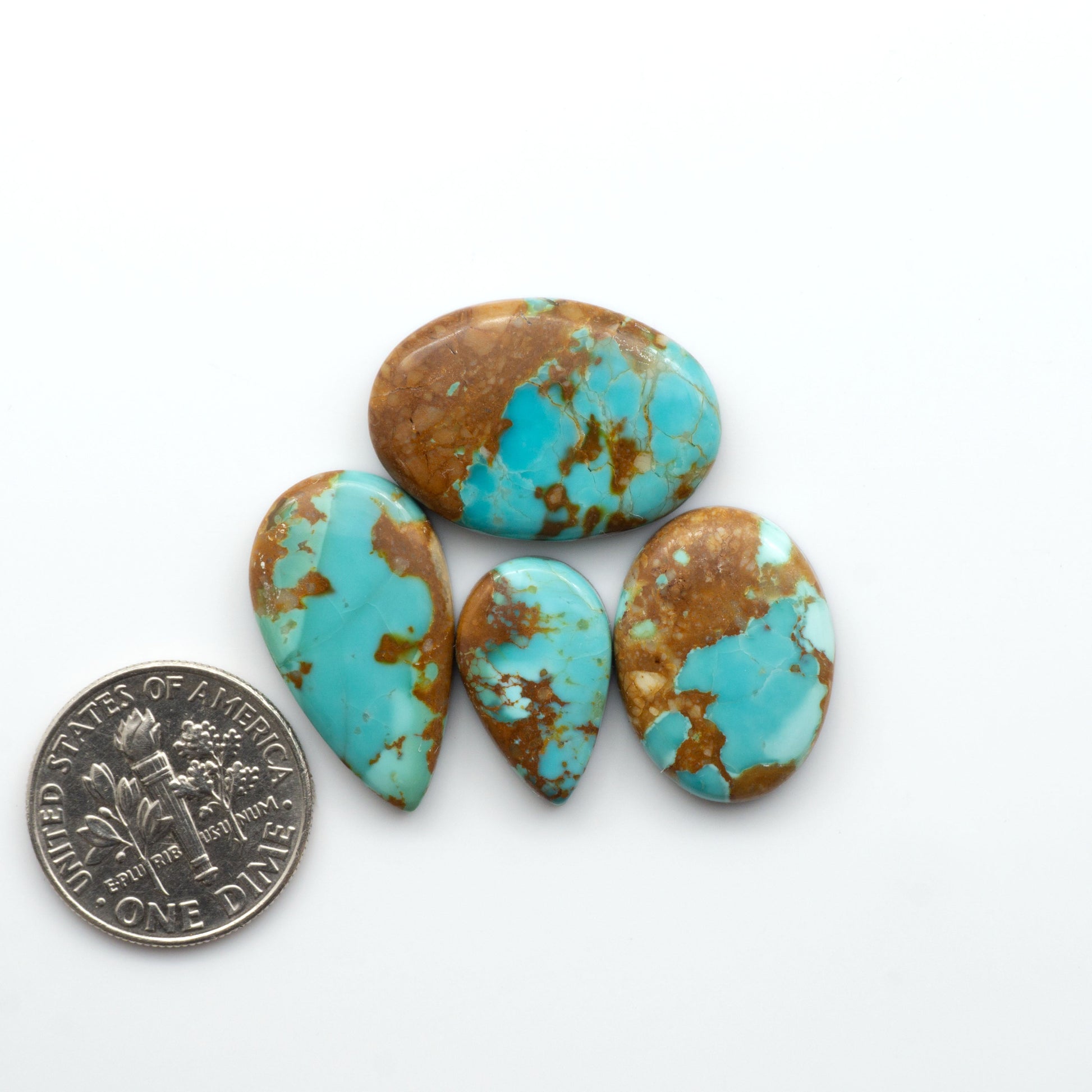 Add a touch of beauty to your collection with our stunning Pilot Mountain Turquoise Cabochons. Perfect for jewelry making each piece is truly one-of-a-kind.