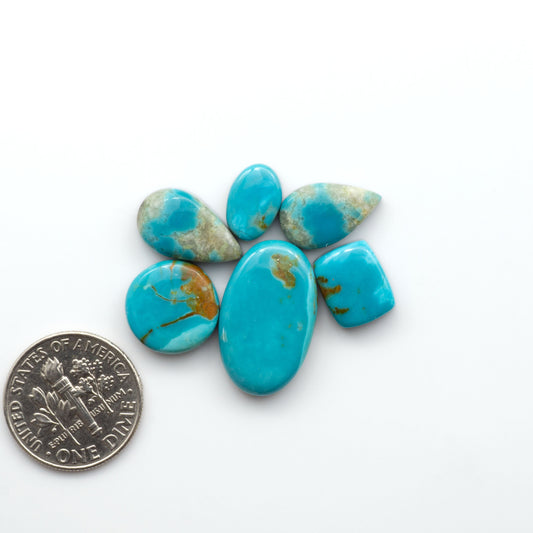 Add a touch of beauty to your collection with our stunning Pilot Mountain Turquoise Cabochons. Perfect for jewelry making each piece is truly one-of-a-kind.