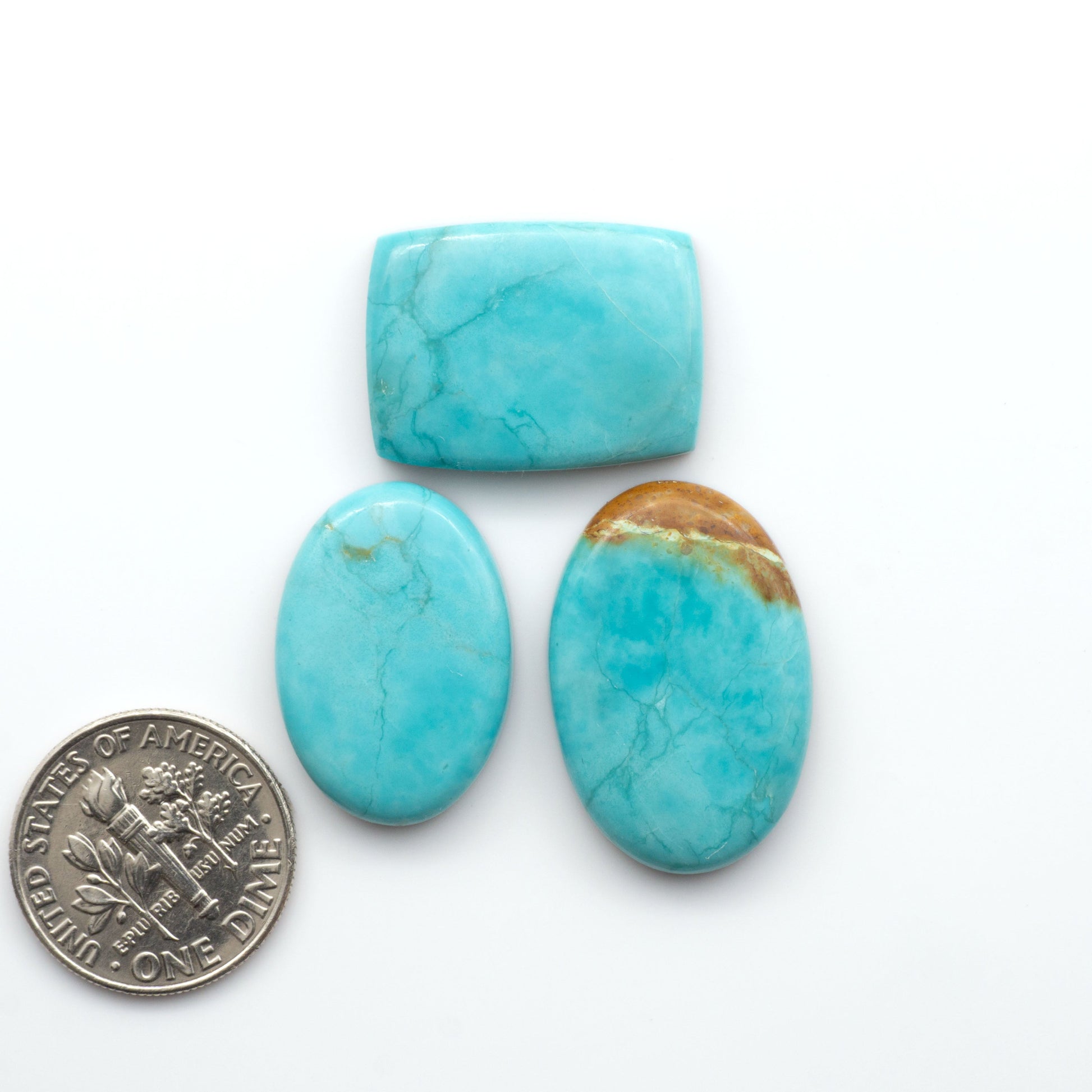 Add a touch of beauty to your collection with our stunning Pilot Mountain Turquoise Cabochons. Perfect for jewelry making each piece is truly one-of-a-kind.