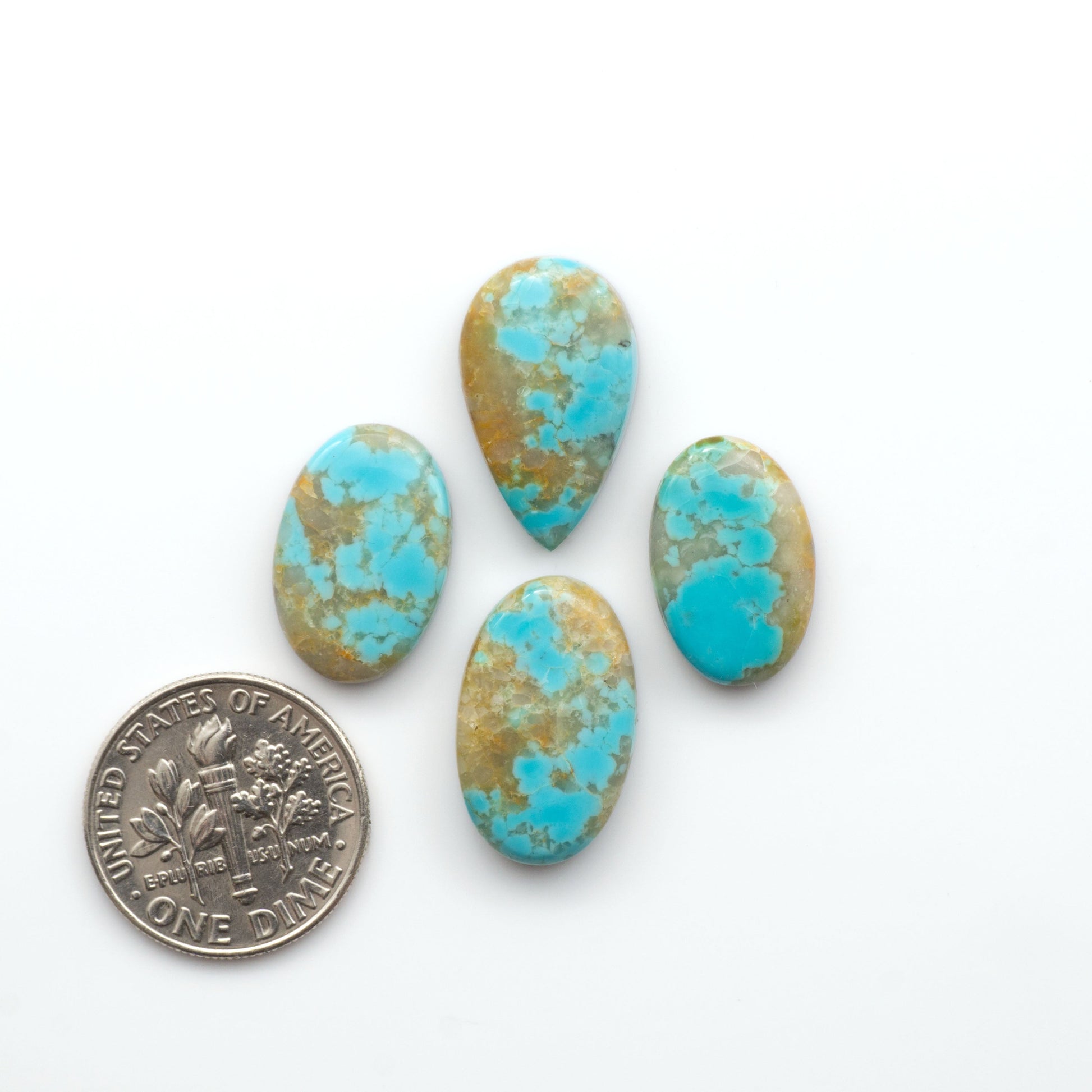 Add a touch of beauty to your collection with our stunning Pilot Mountain Turquoise Cabochons. Perfect for jewelry making each piece is truly one-of-a-kind.