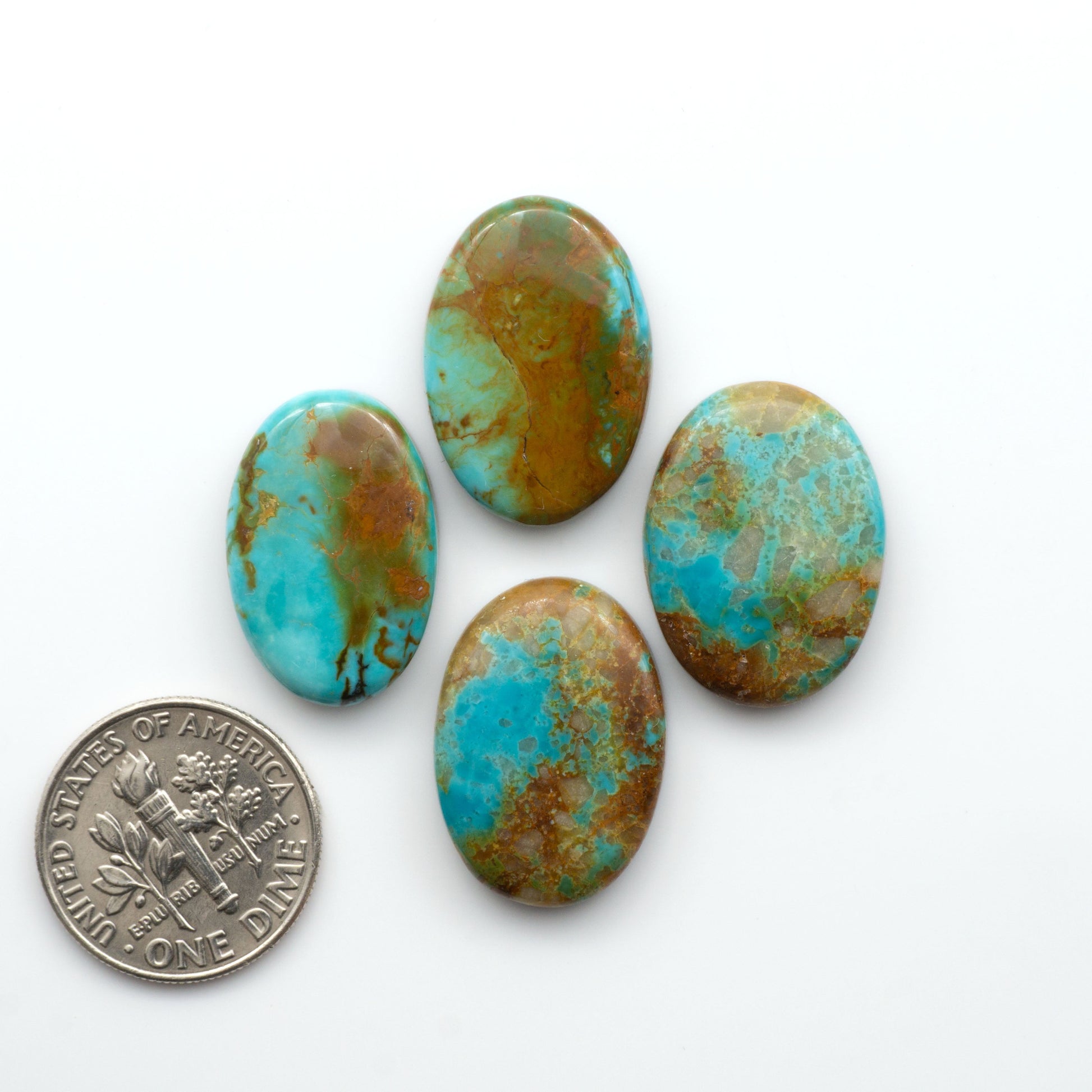 Add a touch of beauty to your collection with our stunning Pilot Mountain Turquoise Cabochons. Perfect for jewelry making each piece is truly one-of-a-kind.