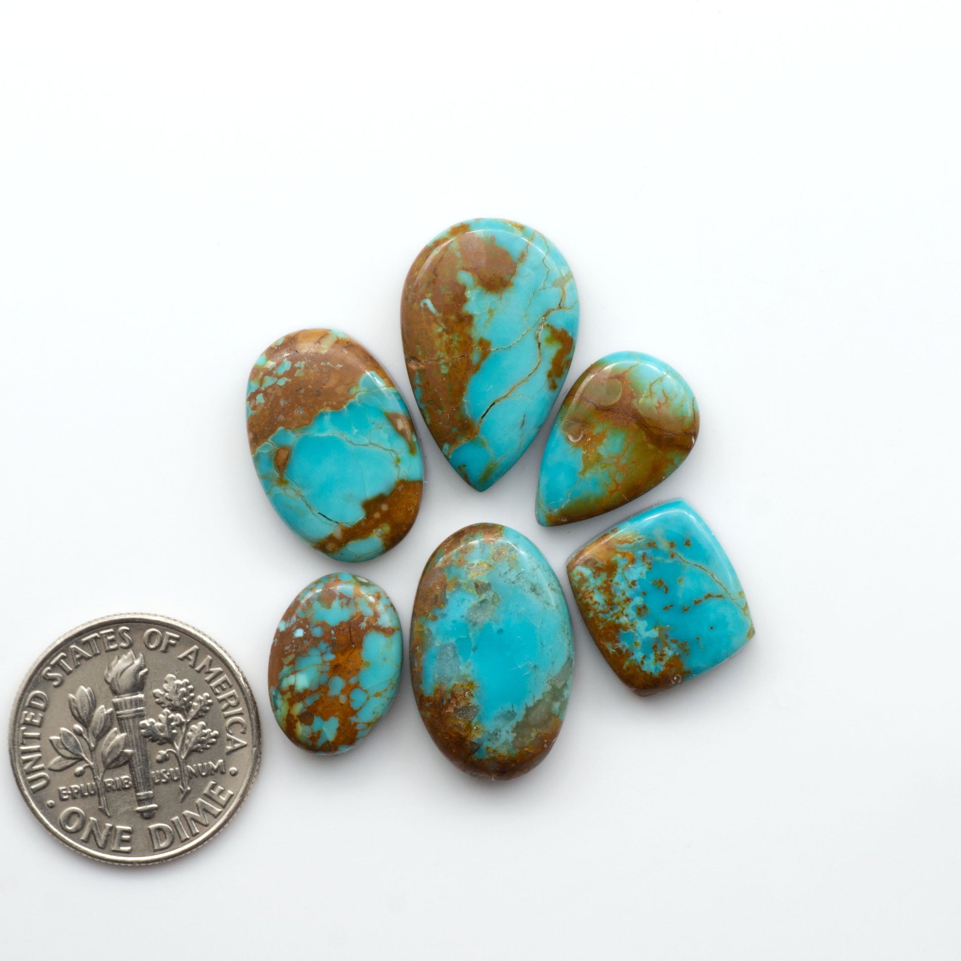 Add a touch of beauty to your collection with our stunning Pilot Mountain Turquoise Cabochons. Perfect for jewelry making each piece is truly one-of-a-kind.