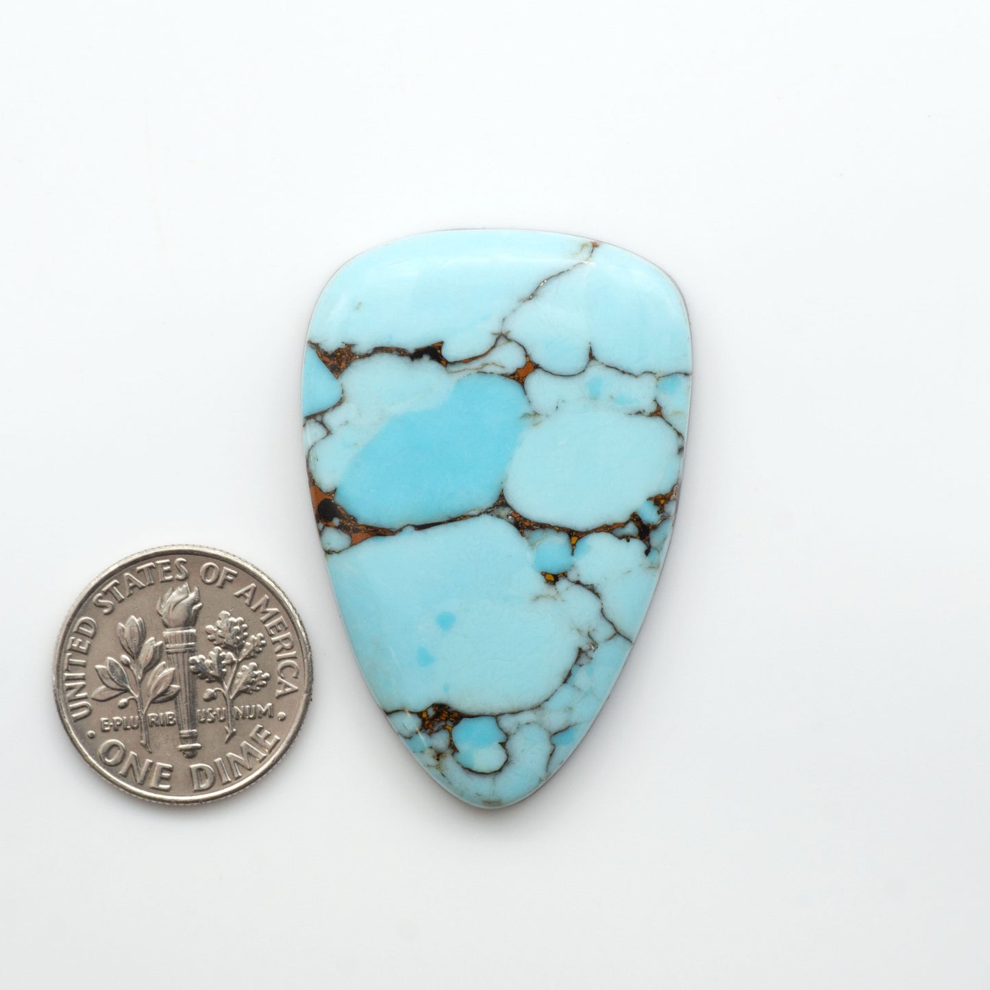 Enhance your jewelry designs with Pressed Turquoise Nugget Cabochons. Crafted from composite materials they add a captivating touch to your creations.

