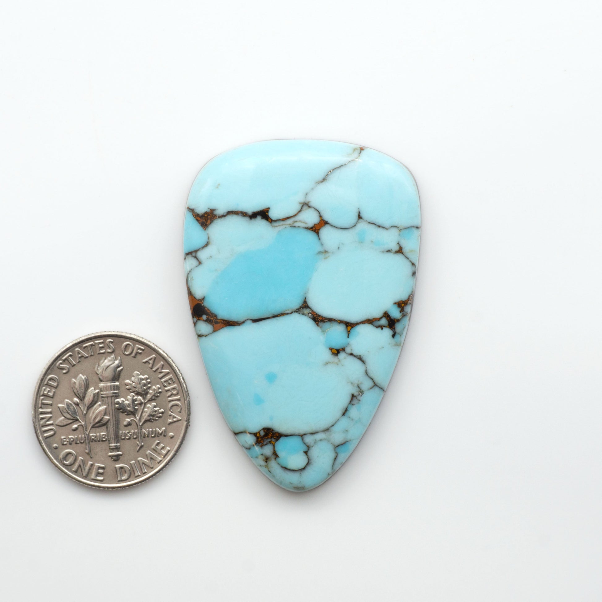 Enhance your jewelry designs with Pressed Turquoise Nugget Cabochons. Crafted from composite materials they add a captivating touch to your creations.

