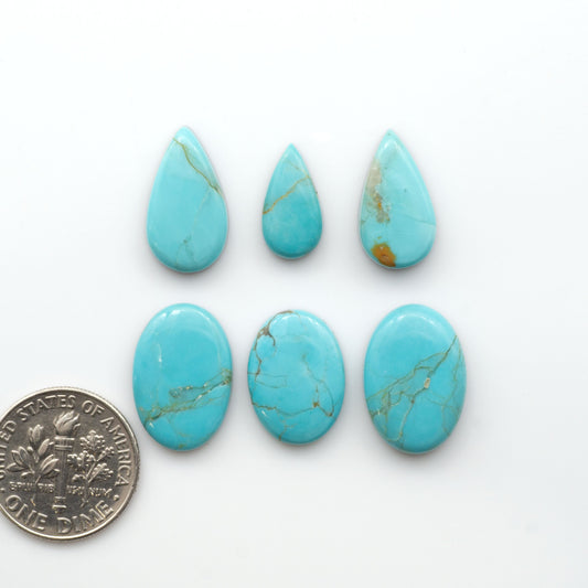 Add a touch of beauty to your collection with our stunning Pilot Mountain Turquoise Cabochons. Perfect for jewelry making each piece is truly one-of-a-kind.

