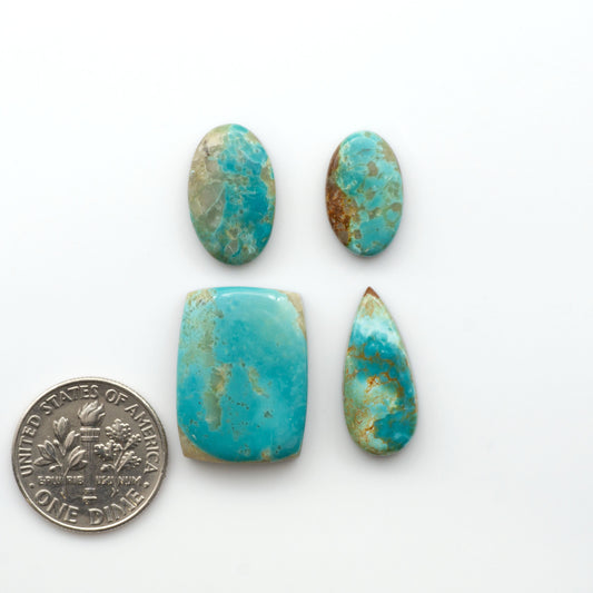 Add a touch of beauty to your collection with our stunning Pilot Mountain Turquoise Cabochons. Perfect for jewelry making each piece is truly one-of-a-kind.

