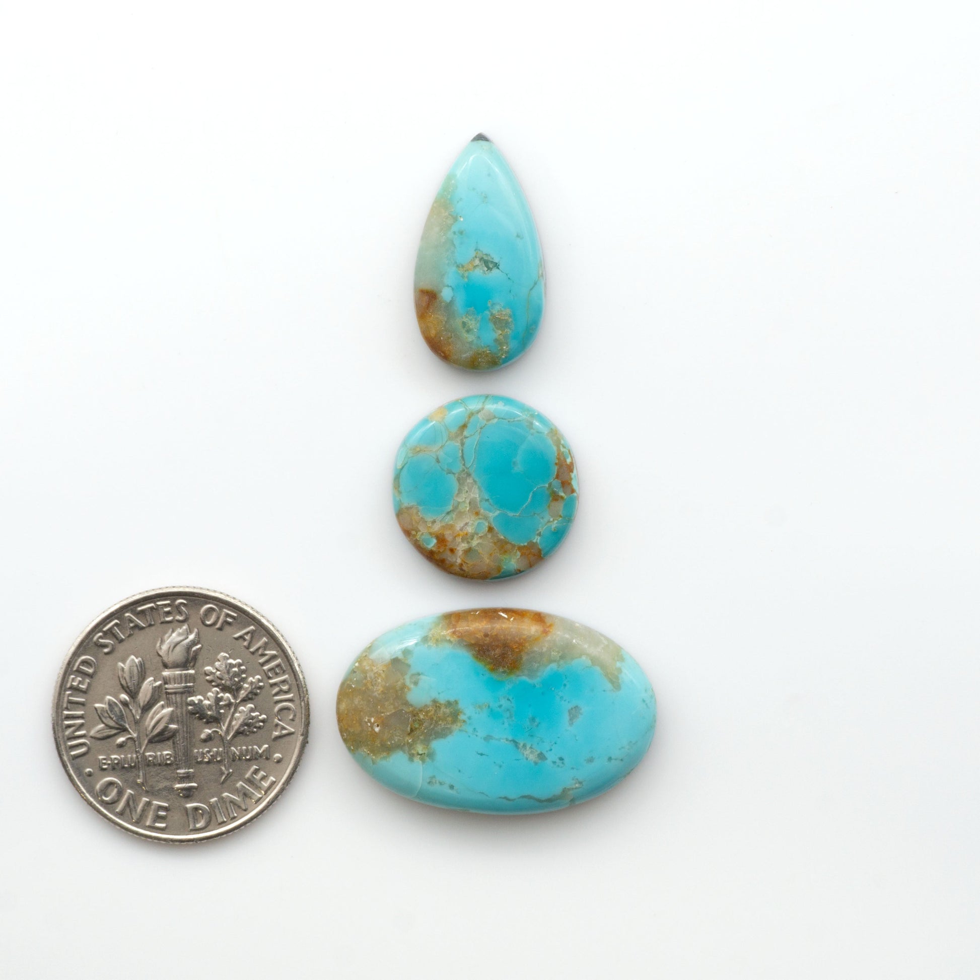 Add a touch of beauty to your collection with our stunning Pilot Mountain Turquoise Cabochons. Perfect for jewelry making each piece is truly one-of-a-kind.


