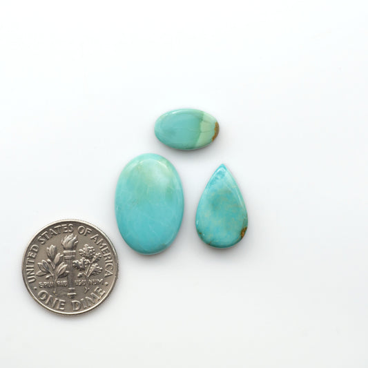 Add a touch of beauty to your collection with our stunning Pilot Mountain Turquoise Cabochons. Perfect for jewelry making each piece is truly one-of-a-kind.

