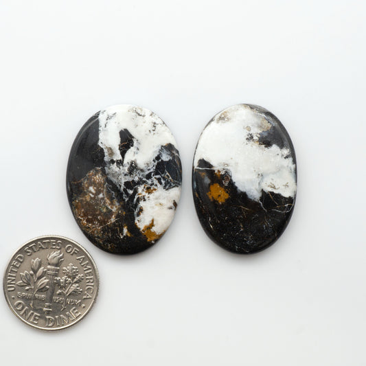 Natural White Buffalo Stone Cabochons are semi-precious gemstones cut into shapes ideal for jewelry-making, making them an excellent choice for artisans.
