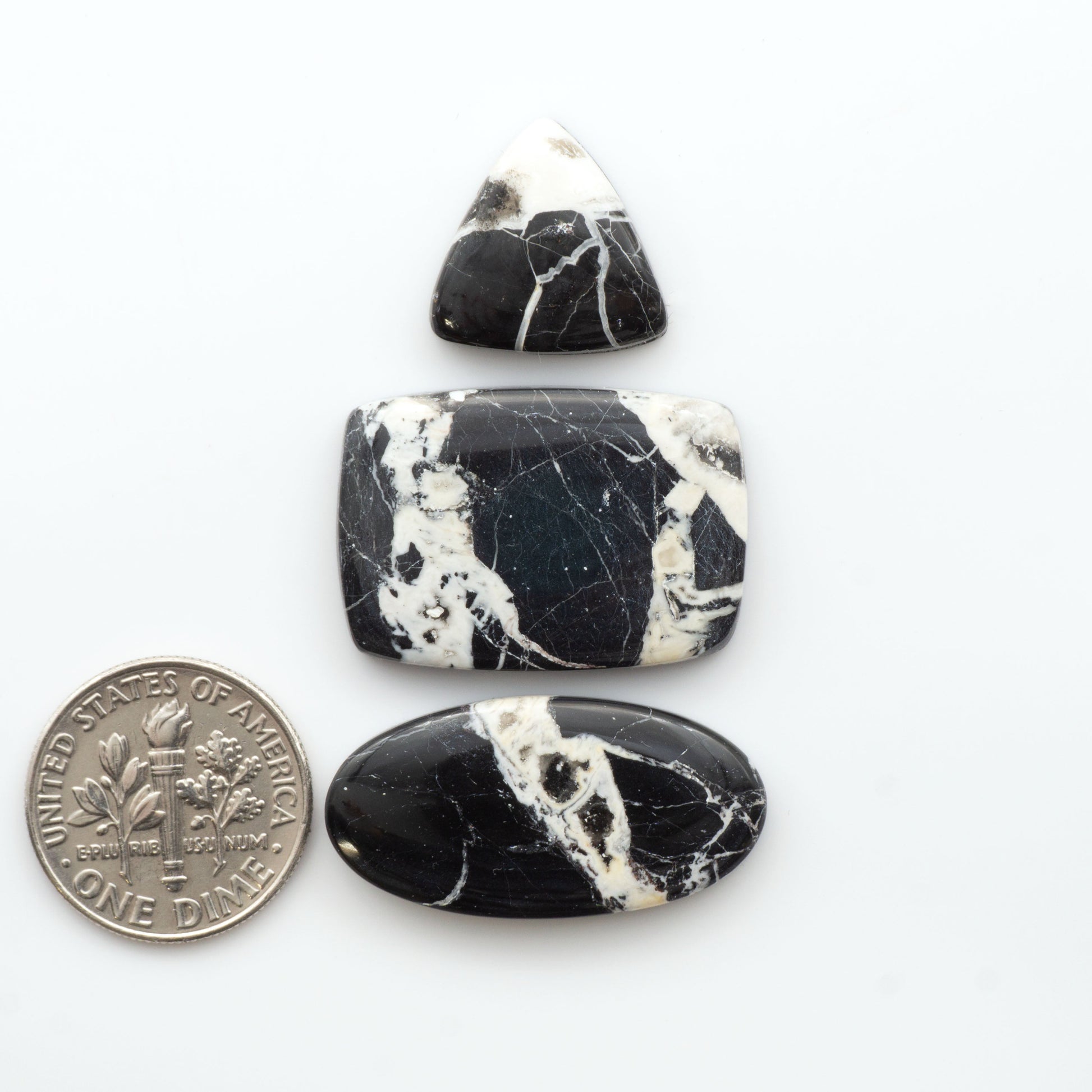 Natural White Buffalo Stone Cabochons are semi-precious gemstones cut into shapes ideal for jewelry-making, making them an excellent choice for artisans.